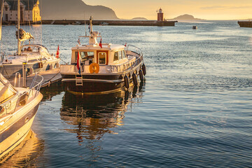 Alesund Sea port with ships at peaceful dawn, Norway, Scandinavia