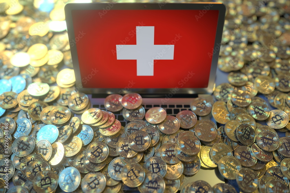Aufkleber computer with flag of switzerland and pile of bitcoins. national regulations and cryptocurrency mini
