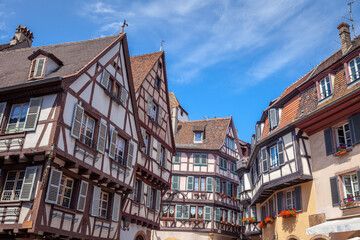 Fototapeta premium Colmar alsatian architecture at springtime with flowers, Eastern France