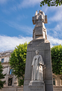 London, UK- July 4, 2022: Off Trafalgar Square. Closeup of Edith Cavell Memorial is stone obelisk with Marble statues featuring her image and appealing humanity on St. Martin Place.