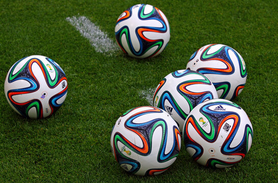 Official FIFA 2014 World Cup balls (Brazuca) on the grass