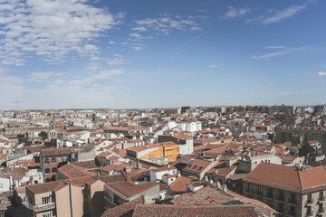 Fototapeta na wymiar Panoramic view of the city of Salamanca desde lo alto de la iglesia on a summer day with the sky almost clear and bluish.