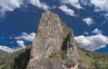 High and steep mountain with a blue sky in Anguiano, spain