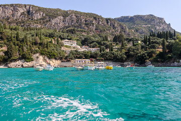 Fototapeta premium Rocky seasides and ocean views of the coastline of Corfu on a sunny day