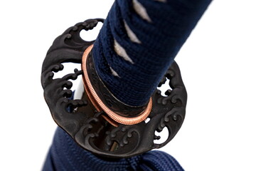 Wave Design Tsuba: Japanese sword hand guard made of steel. Sword hilt and sheath wrapped with navy...