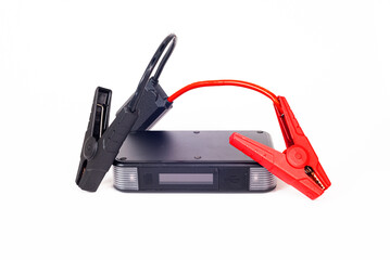 Portable car jump starter. Emergency charger booster Power Bank battery isolated on white background.