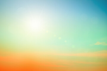Obraz premium Abstract blurred sunlight beach colorful blurred background with retro effect autumn sunset sky have blue bright, white and color orange calm.