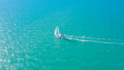 Aerial View of Grahams Beach close to the park, Green Trees and Cliff in New Zealand - Auckland Area