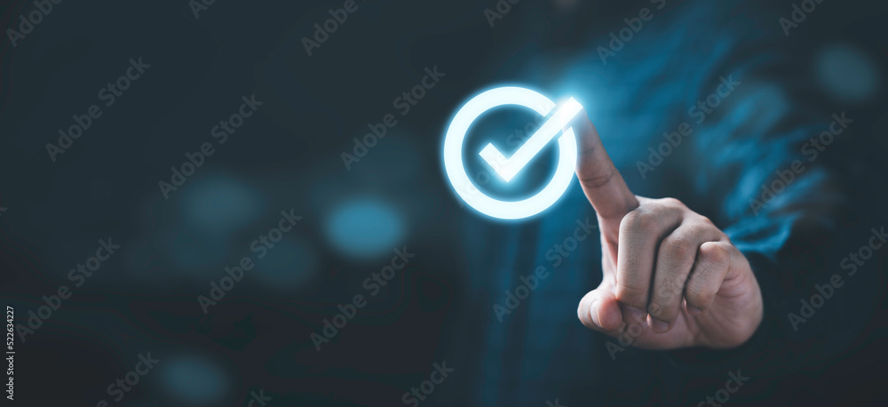Poster businessman hand touching glowing correct sign mark with copy space area for document approval and p