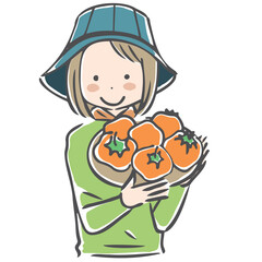 収穫した柿を紹介する作業姿の女性