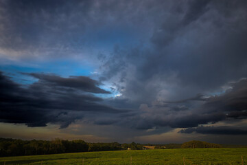 Obraz na płótnie Canvas storm clouds sunset