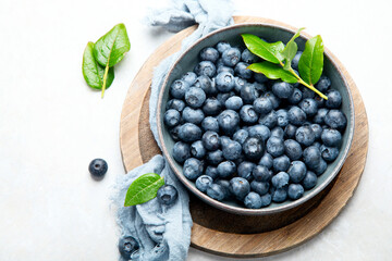 Fresh blueberry on neutral background.
