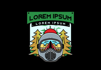 a trail helmet with a pine tree beside