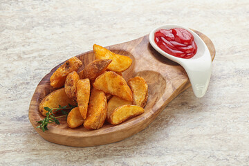 Fried rustic potato with tomato ketcup