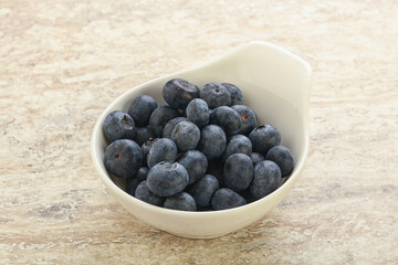 Sweet ripe blueberry heap in the bowl