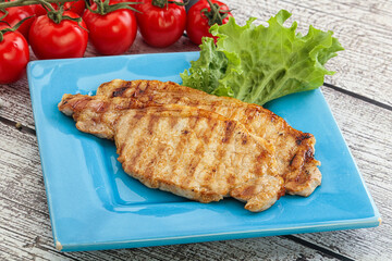 Grilled pork steak with ketchup
