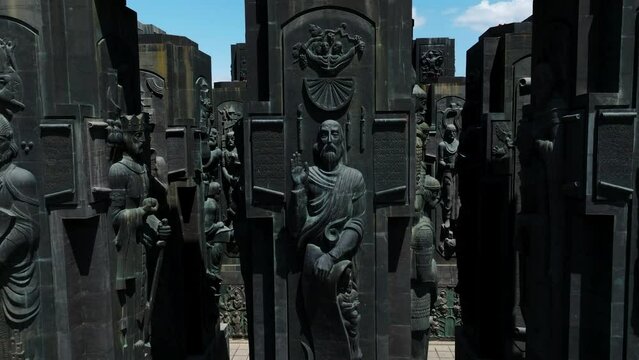 Pillars At Chronicle Of Georgia In Tbilisi, Georgia - drone pullback