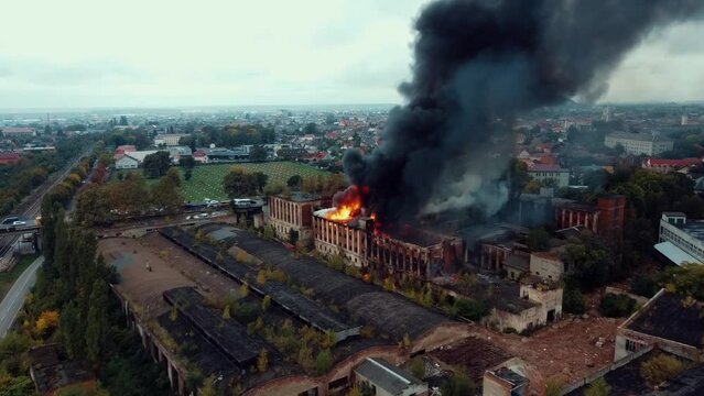 An aerial view of a  building in fire