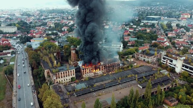 A large view of a building in fire.