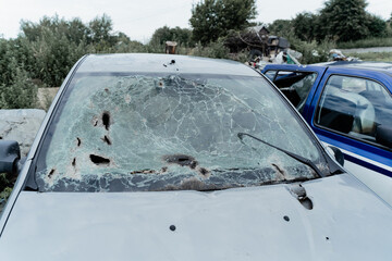 Bucha, Ukraine - July 15 2022: a view of the interior of a car that was shot by Russian troops...
