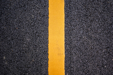 New asphalt road surface with yellow line background