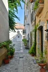 Fototapeta na wymiar A narrow street in Castelvenere, a medieval village in the province of Avellino in Campania, Italy.
