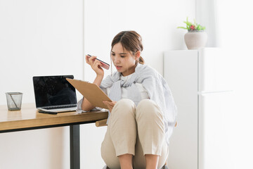 Asian women work at home