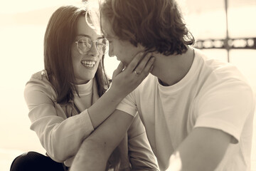 Beautiful couple spend time on a summer park