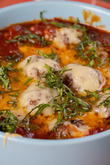 meatballs with cheddar cheese in tomato basil sauce
