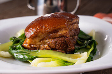 braised whole pork belly in sweetened soy sauce with steamed Taiwan pechay also known as hong ma