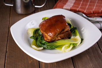 braised whole pork belly in sweetened soy sauce with steamed Taiwan pechay also known as hong ma