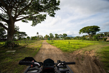 riding ATV inside the forest