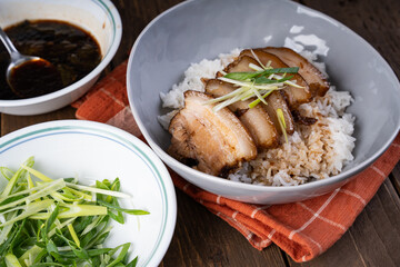 braised whole pork belly in sweetened soy sauce with steamed Taiwan pechay also known as hong ma