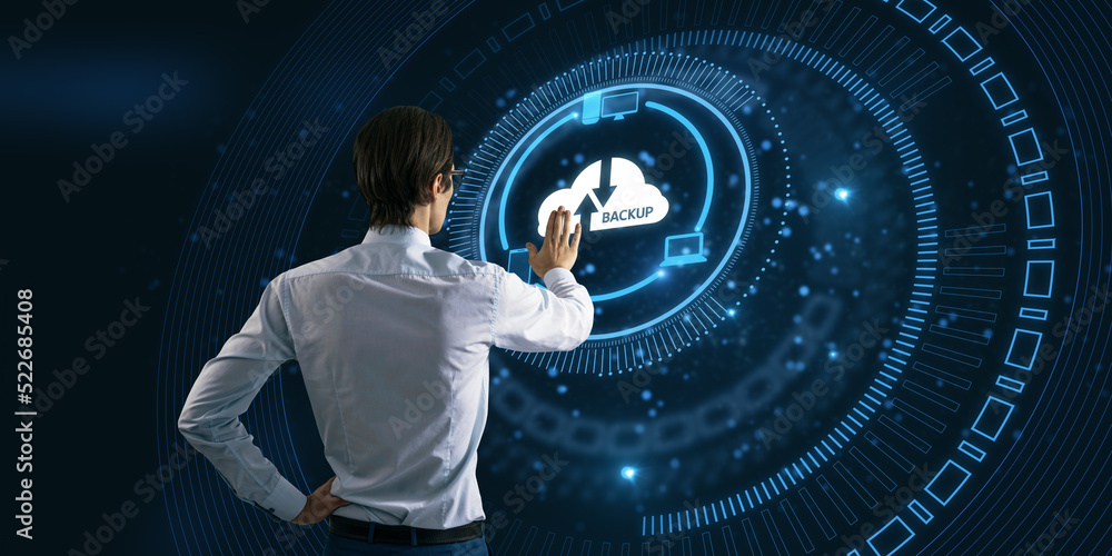 Poster back view of young businessman pointing at abstract glowing cloud hologram on blurry dark background