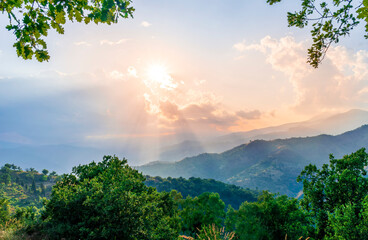 Obraz na płótnie Canvas Mountain valley during sunset or sunrise. Natural spring or summer season landscape