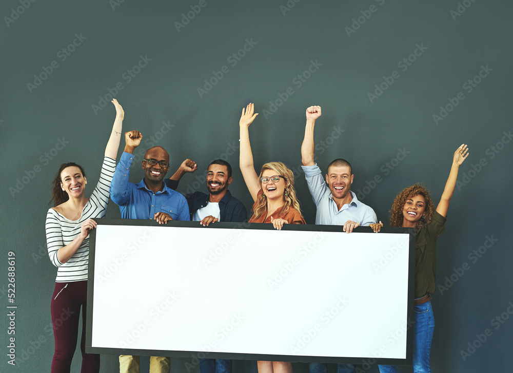 Poster Excited business people showing a blank sign, promoting a product and giving a message on a board while standing together in an office at work. Portrait of happy colleagues holding an empty poster