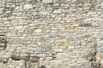Photo of a stone wall. Abstract background.