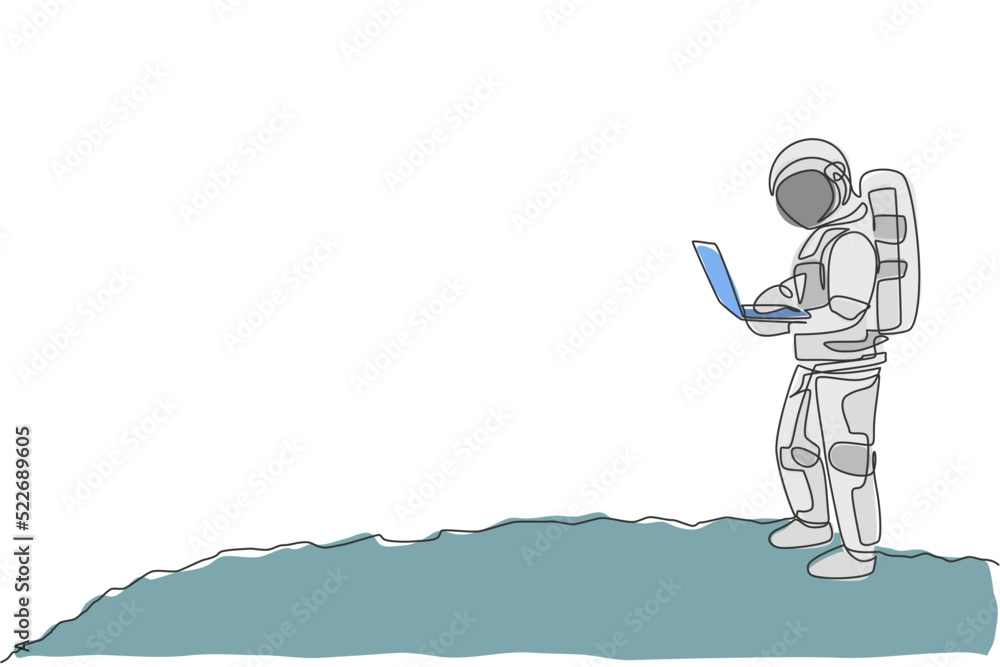 Poster one continuous line drawing of young spaceman on spacesuit standing while typing in moon surface. as