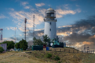 Fototapeta na wymiar Landscape with a view of the Yenikalsky lighthouse. Kerch, Crimea