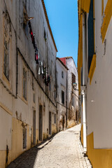 Scenic view of the old town of Elvas in Alentejo, Portugal. Narrow streets of whitewashed white houses