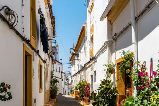 Scenic view of the old town of Elvas in Alentejo, Portugal. Narrow streets of whitewashed white houses