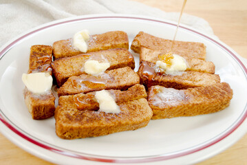 French Toast Sticks Breakfast with Butter & Maple Syrup	