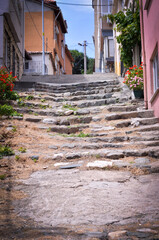 Fototapeta na wymiar Old stone stairs in the city