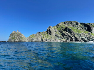 Fototapeta na wymiar Rocky Cape Elagina (of Elagin) on Askold Island in summer. Russia, Primorsky Krai