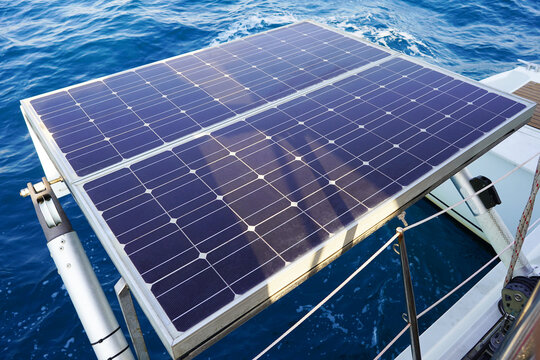 Solar panel on sailing yacht in the sea. Monocrystalline and Polycrystalline Solar Panels in yachting. Solar panel, photovoltaic, alternative electricity source on boat