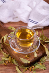 Linden tea. Linden tea on wood floor. Herbal tea concept. Healthy drinks. close up