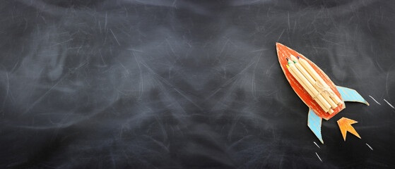 education. Back to school concept over blackboard background. top view, flat lay