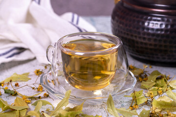 Linden tea. Linden tea on stone background. Herbal tea concept. Healthy drinks. close up