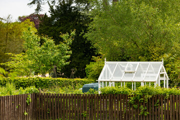 glass Greenhouse in English vegetable garden.