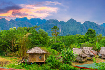 Vang Vieng Laos a beautiful city on the river with huge rising mountains and slow flowing river. 